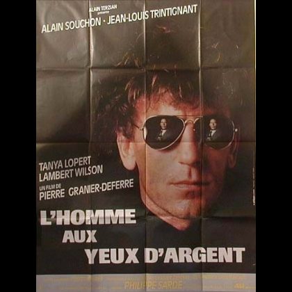 L'HOMME AUX YEUX D'ARGENT