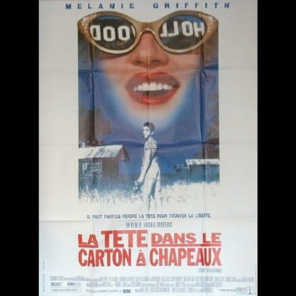 LA TETE DANS LE CARTON A CHAPEAUX