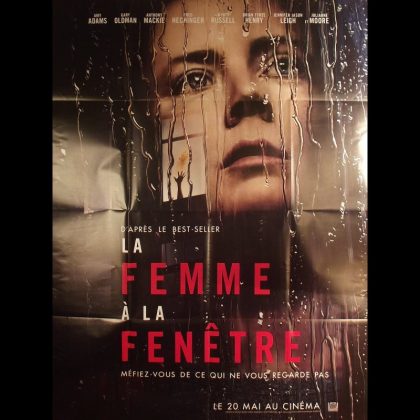 LA FEMME A LA FENETRE